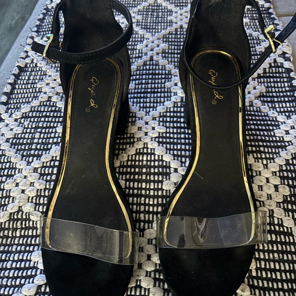 Black and gold heels with clear strap